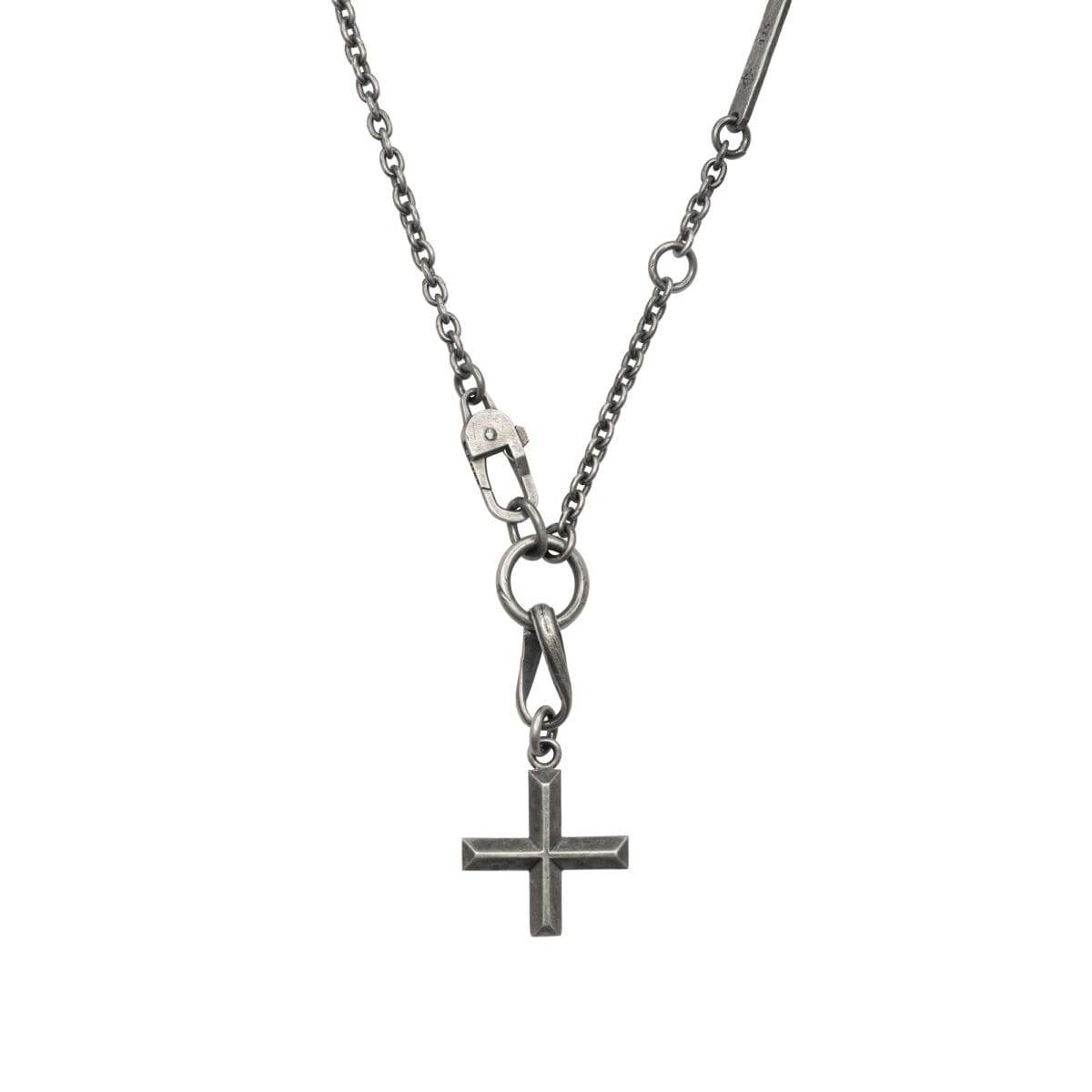 Beveled cross silver pendant on a decorative chain