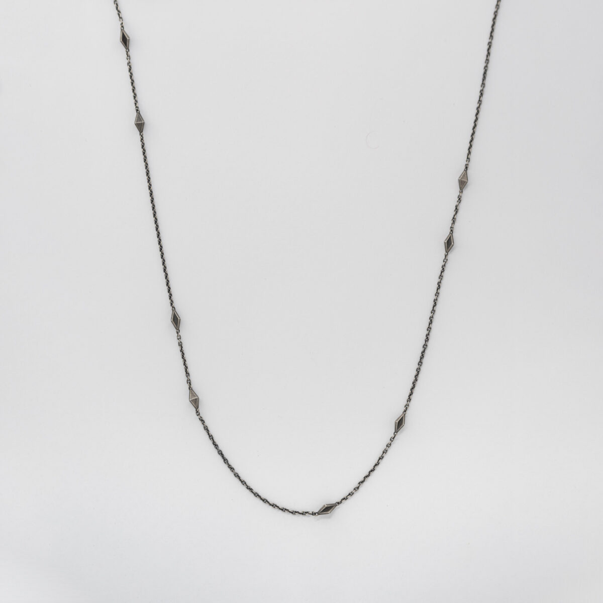 thin chain with diamond shaped segments